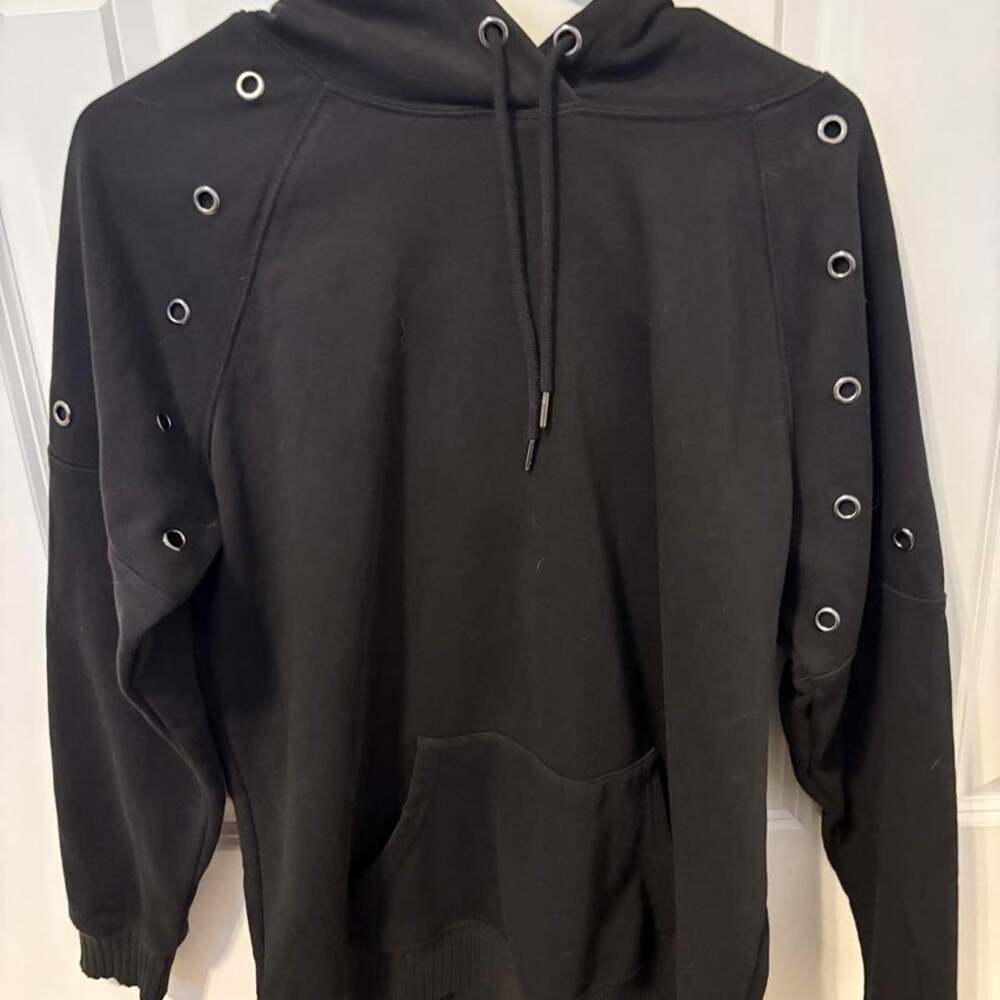 Black hoodie with silver grommets